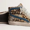 Slide para mujer en piel de potro con estampado de leopardo y estrella de cuero plateada