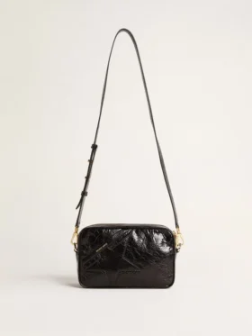 Star Bag en cuero negro brillante con estrella tono sobre tono