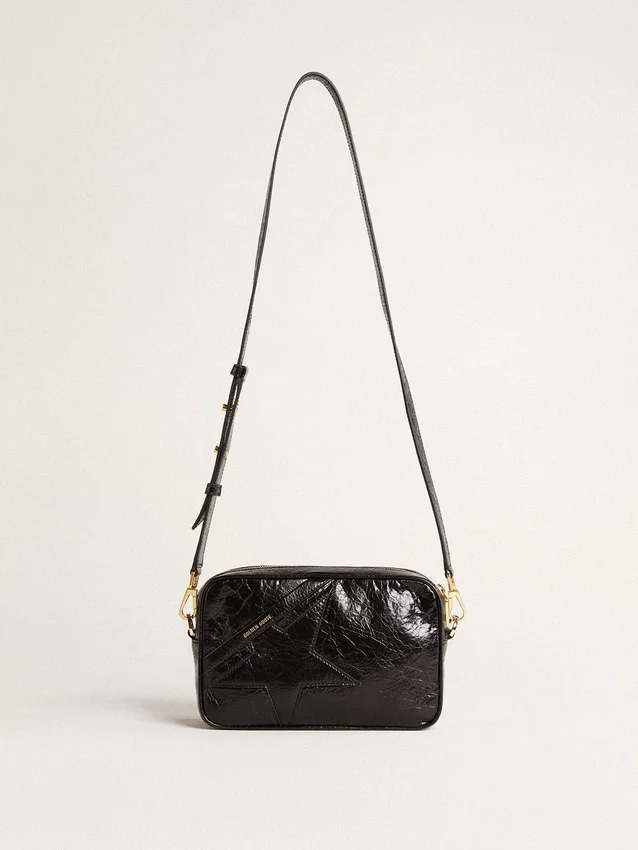 Star Bag en cuero negro brillante con estrella tono sobre tono
