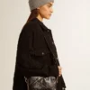 Star Bag en cuero negro brillante con estrella tono sobre tono