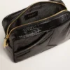 Star Bag en cuero negro brillante con estrella tono sobre tono