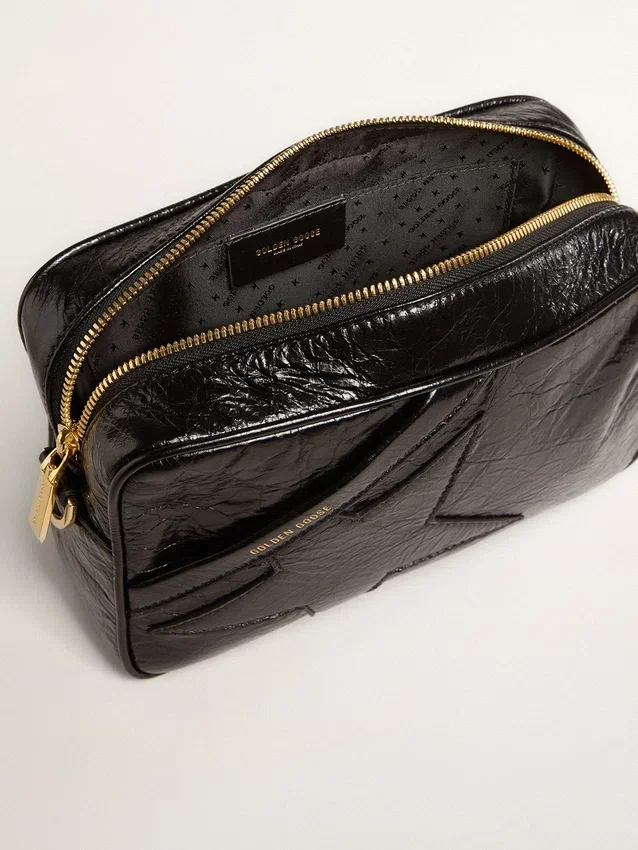 Star Bag en cuero negro brillante con estrella tono sobre tono