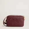 Star Bag en cuero rojo vino con estrella tono sobre tono