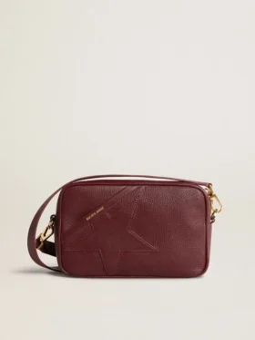 Star Bag en cuero rojo vino con estrella tono sobre tono