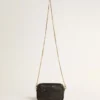 Star Bag Mini de cuero negro con estrella tono sobre tono