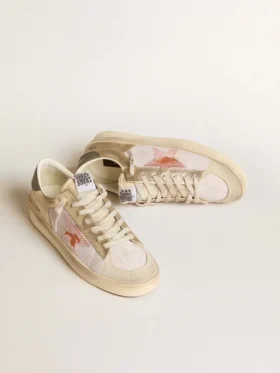 Stardan en malla blanca con estrella naranja e inserciones de cuero platino
