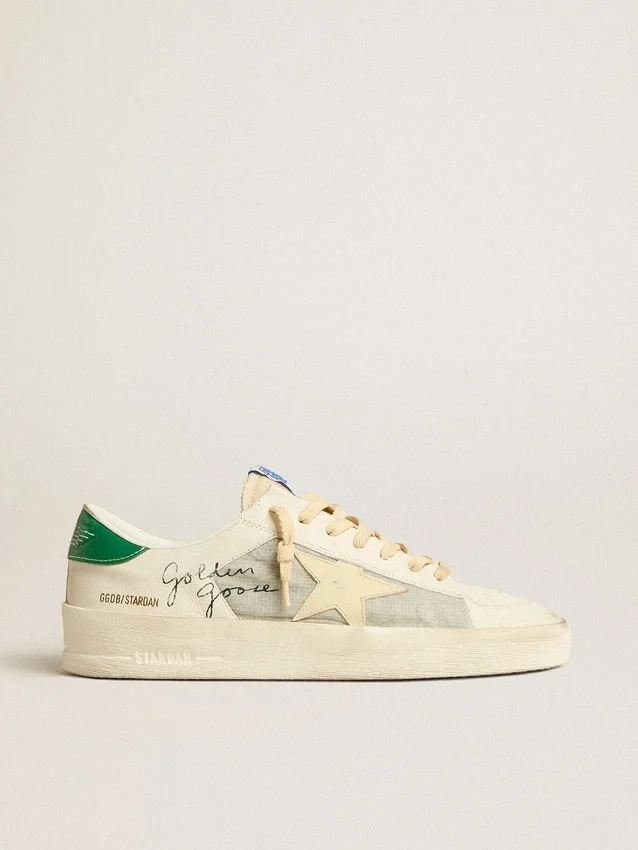 Stardan en piel napa blanca con estrella de piel color crema