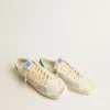 Stardan en piel napa blanca con estrella de piel color crema