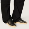 Stardan para hombre en cuero negro con estrella y lengüeta en el talón de cuero negro