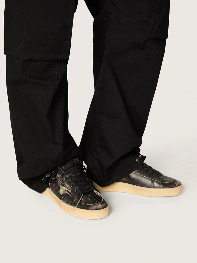 Stardan para hombre en cuero negro con estrella y lengüeta en el talón de cuero negro