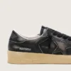 Stardan para hombre en cuero negro con estrella y lengüeta en el talón de cuero negro