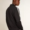 Sudadera azul oscuro con franja blanca y estrellas azules en contraste