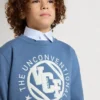 Sudadera azul para niños con parches blancos en relieve