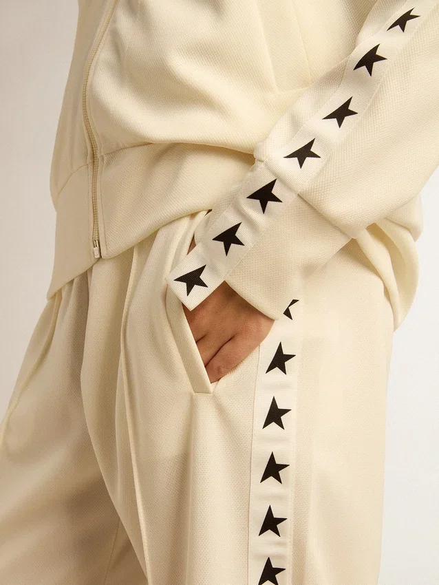 Sudadera blanca con cremallera para mujer, con franja blanca y estrellas negras