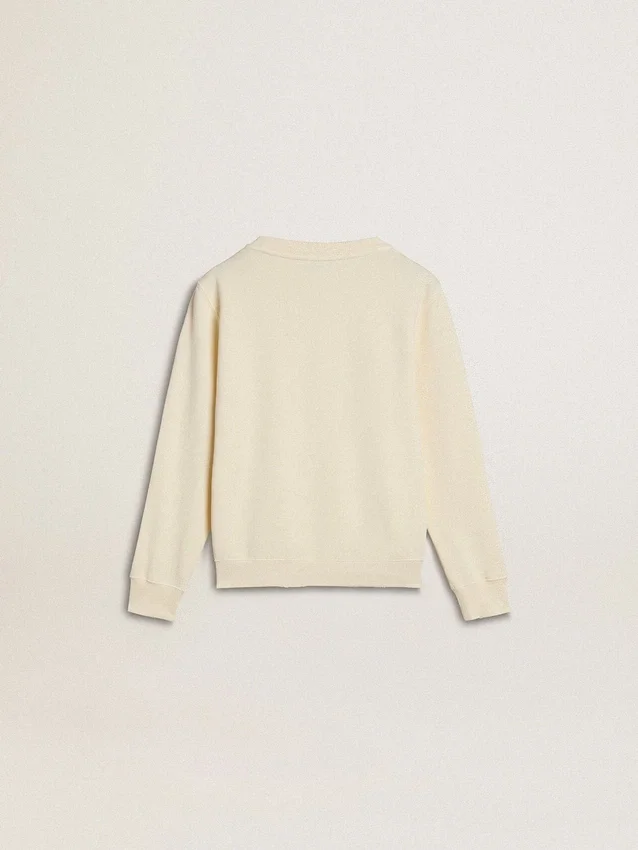 Sudadera color crema para niñas con letras en parches