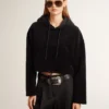 Sudadera de chenilla negra para mujer con bordado en la espalda