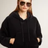 Sudadera de chenilla negra para mujer con bordado en la espalda