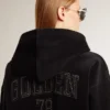Sudadera de chenilla negra para mujer con bordado en la espalda