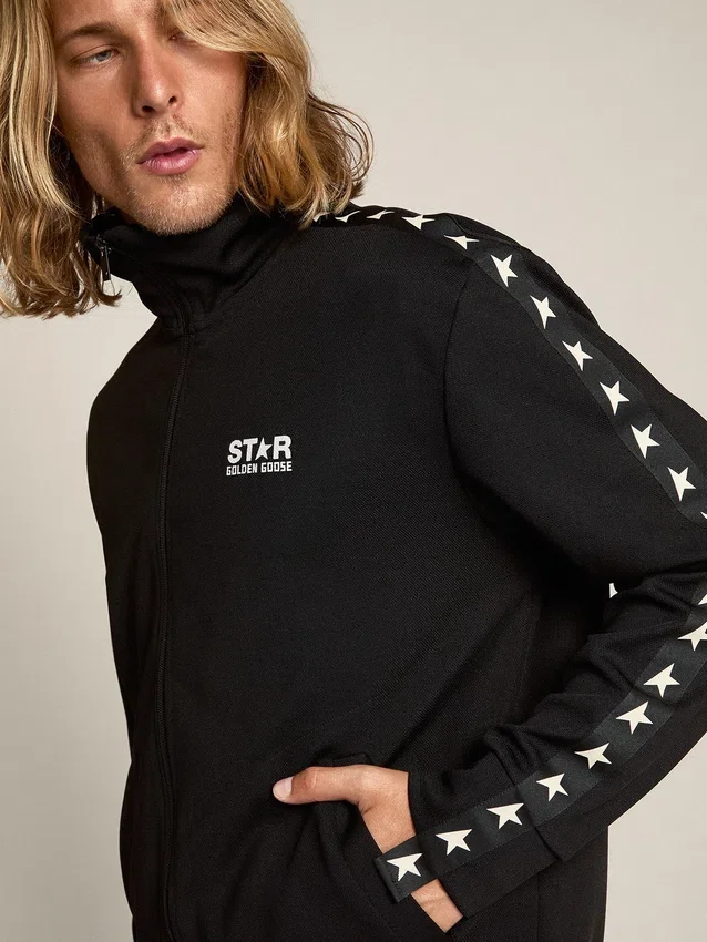 Sudadera negra con cremallera para hombre con estrellas blancas