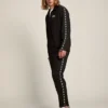 Pantalones de chándal negros para hombre con estrellas blancas en los costados