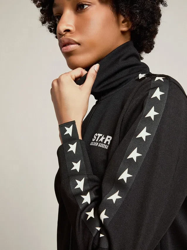 Sudadera negra con cremallera para mujer con estrellas blancas