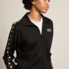 Sudadera negra con cremallera para mujer con estrellas blancas