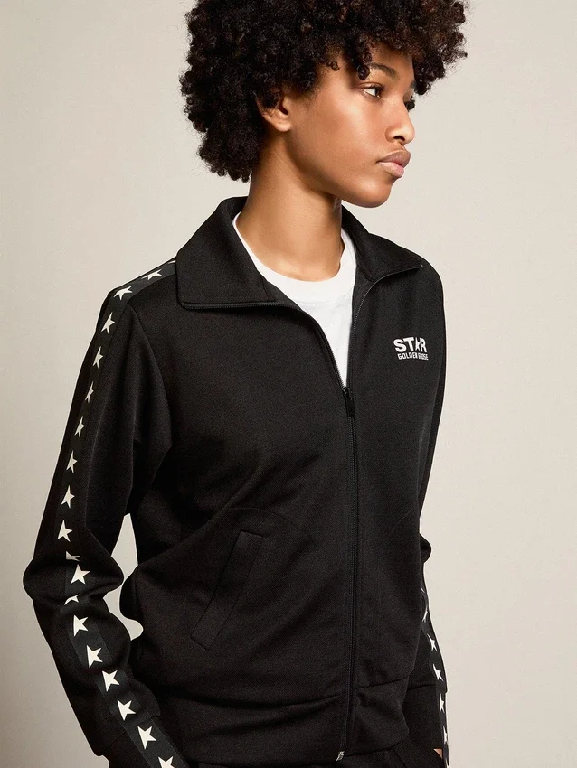 Sudadera negra con cremallera para mujer con estrellas blancas