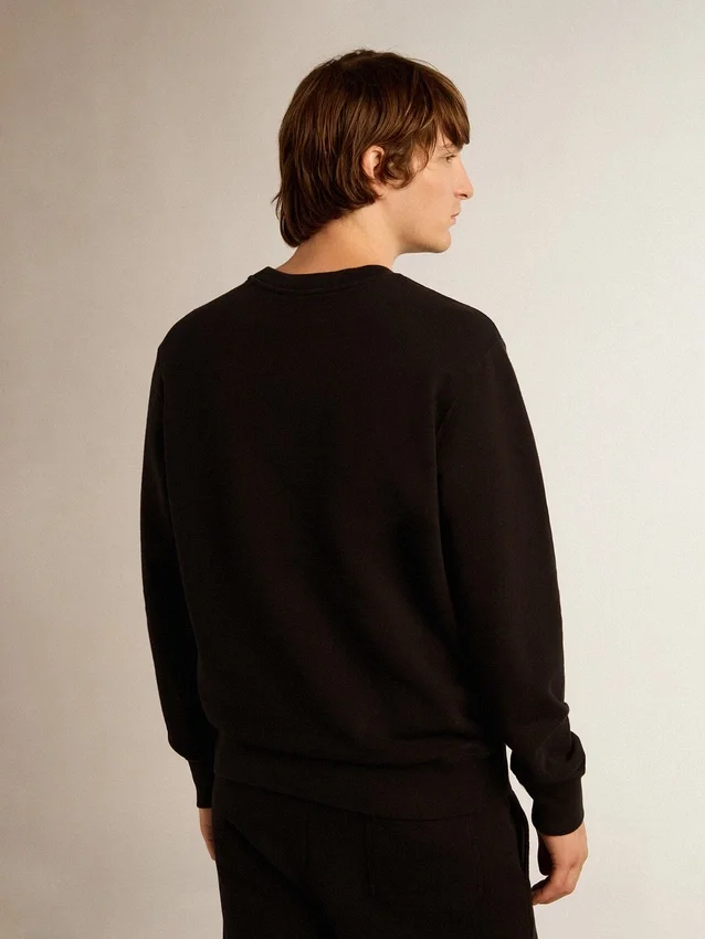 Sudadera negra de la Star Collection con estrella tono sobre tono en el frente