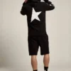 Sudadera negra de la Star Collection con estrellas blancas en contraste