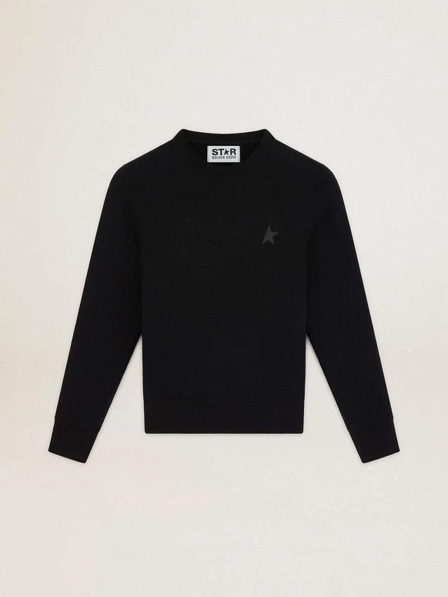 Sudadera negra de la Star Collection con una estrella tono sobre tono en el frente