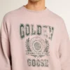 Sudadera unisex de cuello redondo en rosa antiguo con estampado de logotipo verde