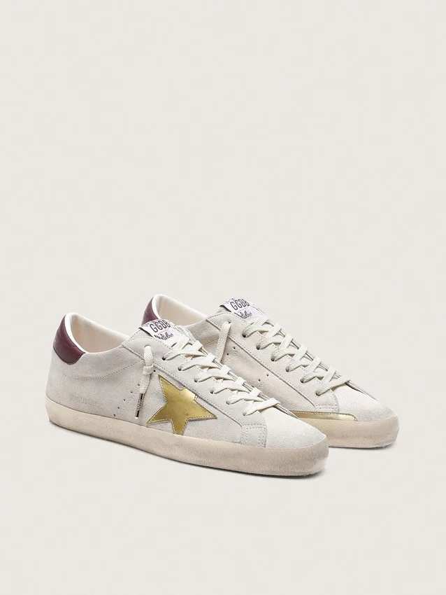 Super-Star CNY para hombre en gamuza color marfil con estrella de cuero metalizado y lengüeta del talón de cuero