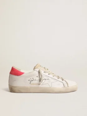 Super-Star de cuero blanco para mujer con estrella perforada y lengüeta de nylon fucsia en el talón