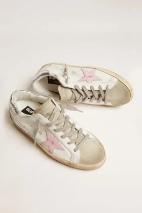 Super-Star de cuero para mujer con estrella rosa y lengüeta plateada en el talón
