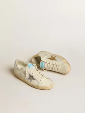Super-Star en cuero y gamuza blancos con estrella de cuero plateada y dorada
