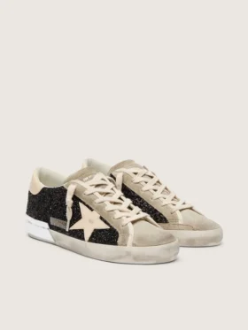 Super-Star en negro con purpurina, estrella color crema e inserciones de gamuza