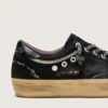 Super-Star LAB para mujer en gamuza laminada negra y nylon con estrella en relieve y cordones con cristales