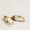 Super-Star LTD en cuero beige con estrella de gamuza verde y lengüeta en el talón de cuero con lámina plateada