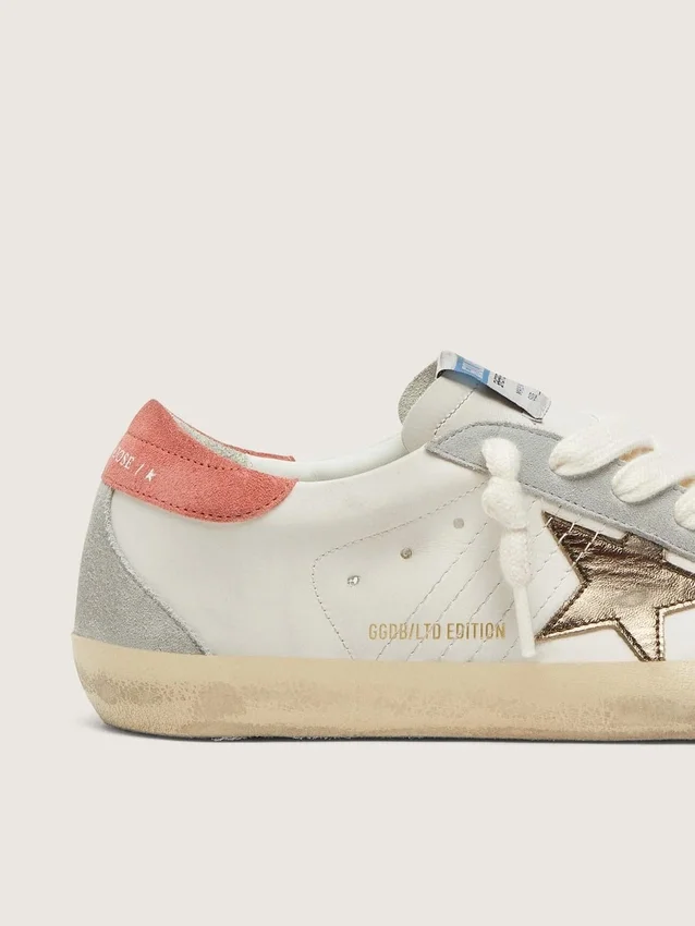 Super-Star LTD para mujer en cuero blanco con estrella de bronce metalizado