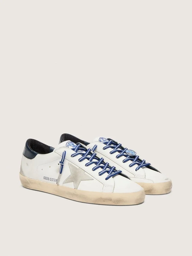Super-Star LTD para mujer en cuero blanco con estrella de gamuza y lengüeta de talón de cuero azul