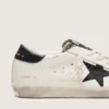 Super-Star LTD para mujer en cuero blanco con estrella negra y detalles de piel de potro