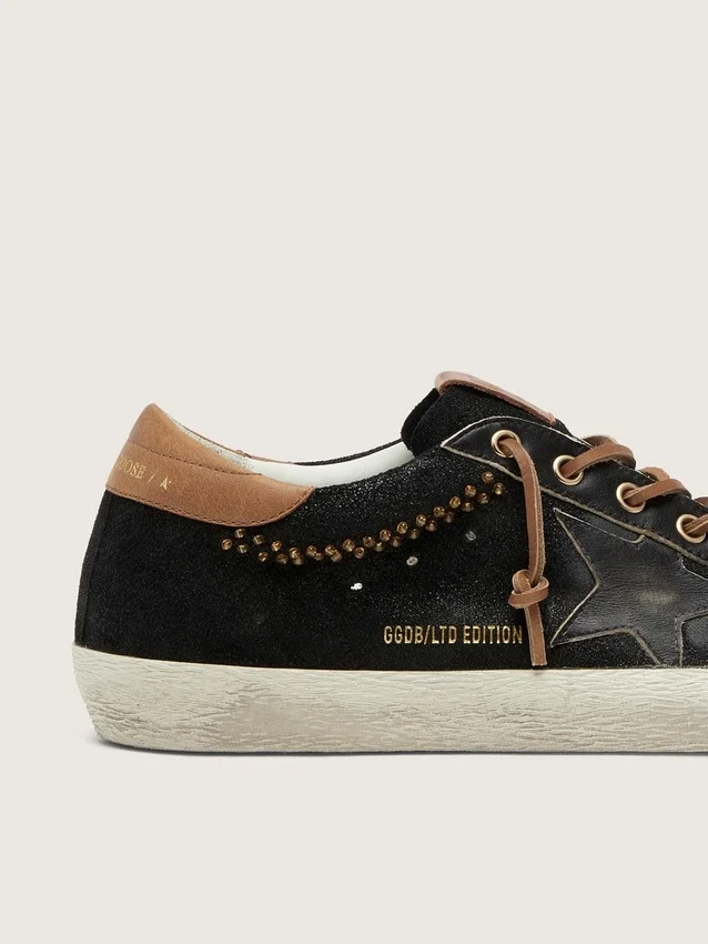 Super-Star LTD para mujer en cuero negro con purpurina y estrella de cuero negro