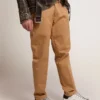 Super-Star para hombre con lengüeta negra en el talón y letras con tachuelas metálicas