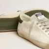 Super-Star para hombre de origen biológico con estrella perforada y lengüeta verde en el talón