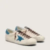 Super-Star para hombre en cuero blanco con estrella de gamuza turquesa