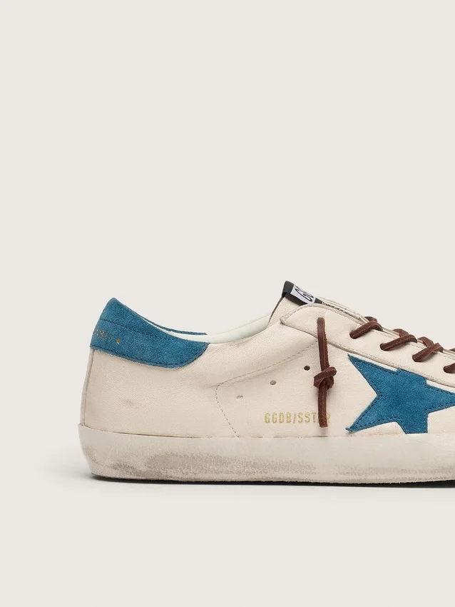 Super-Star para hombre en cuero blanco con estrella de gamuza turquesa