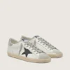 Super-Star para hombre en cuero blanco con estrella de nubuck negro y lengüeta del talón de cuero metalizado plateado