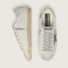 Super-Star para hombre en cuero blanco con estrella de nubuck negro y lengüeta del talón de cuero metalizado plateado