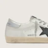 Super-Star para hombre en cuero blanco con estrella de nubuck negro y lengüeta del talón de cuero metalizado plateado