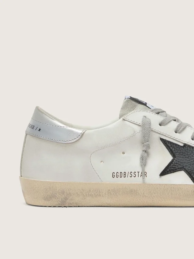 Super-Star para hombre en cuero blanco con estrella de nubuck negro y lengüeta del talón de cuero metalizado plateado